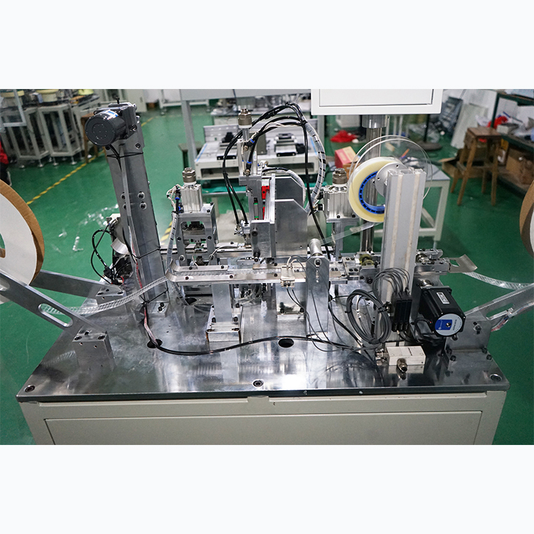 TAPING MACHINE