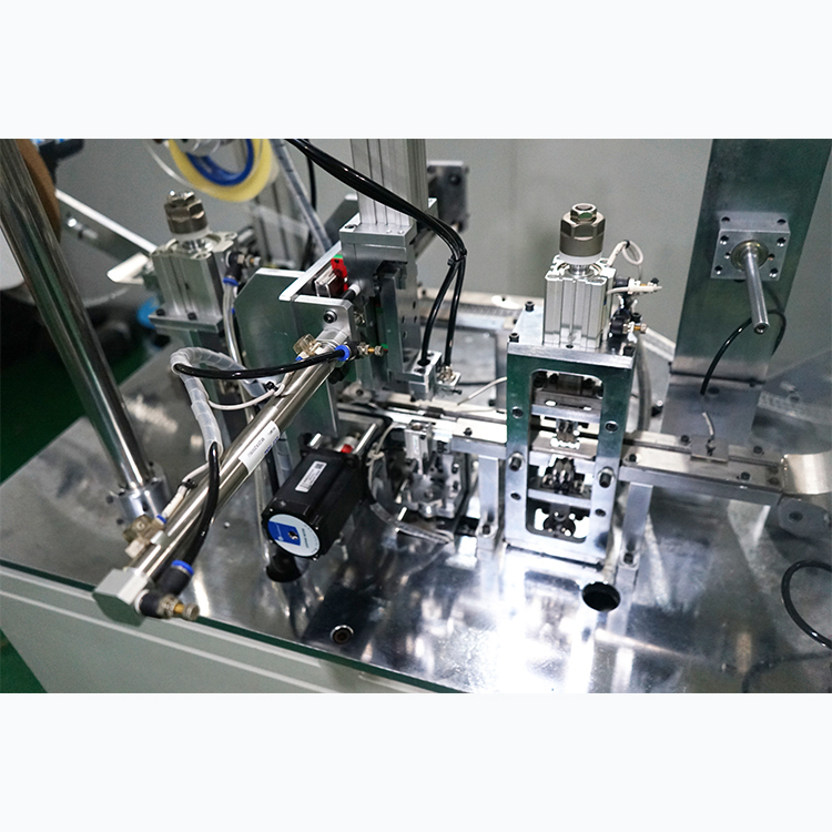 TAPING MACHINE