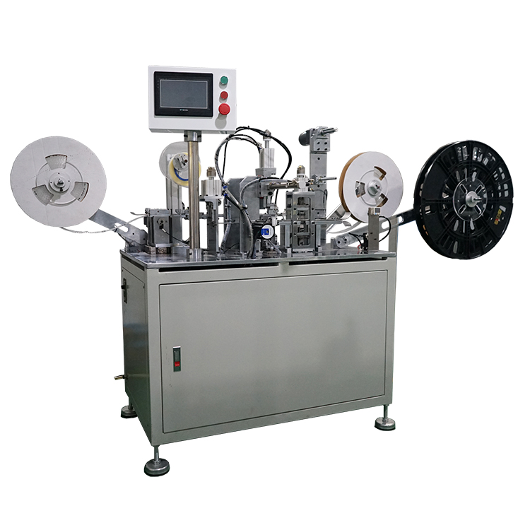 TAPING MACHINE